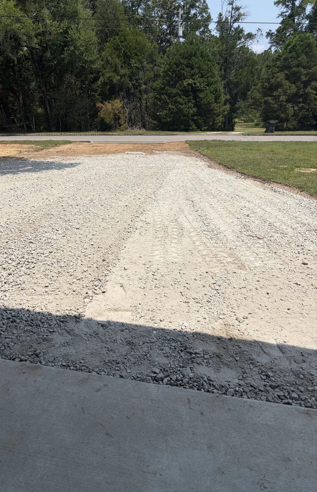 The same driveway after the gravel was spread and tied into the road